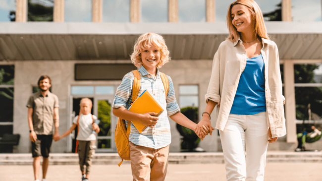 mother and son attending a new parent night at school