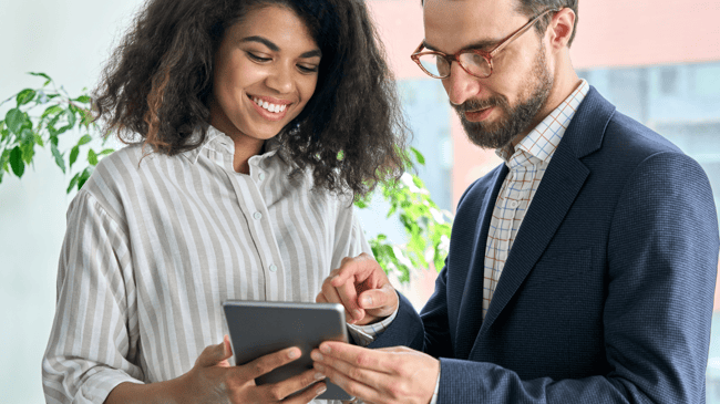 school marketer discussing plan with principal