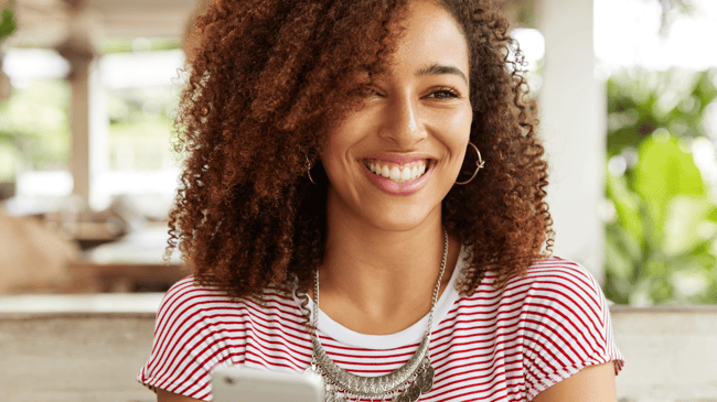 smiling woman with curly hair