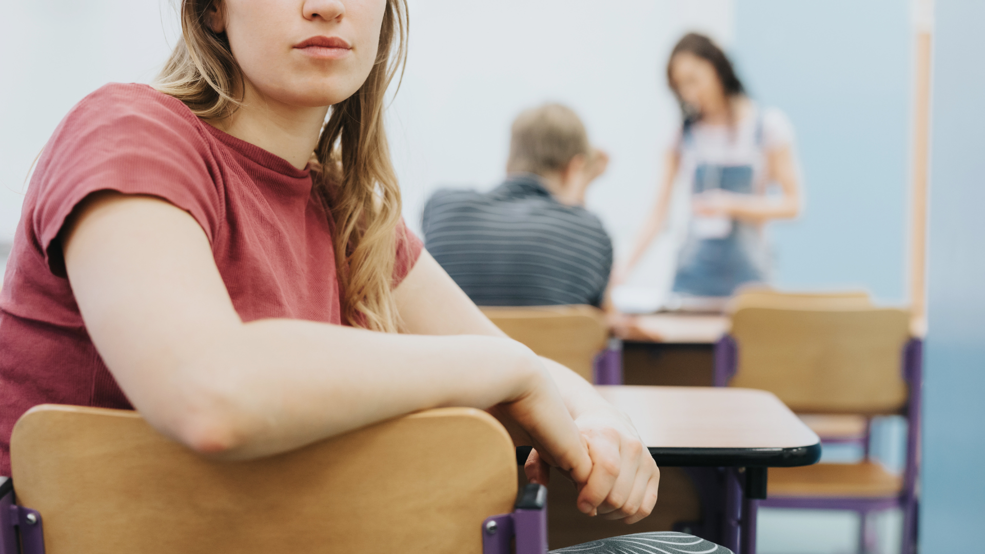 a chronically absent student distracted in a classroom